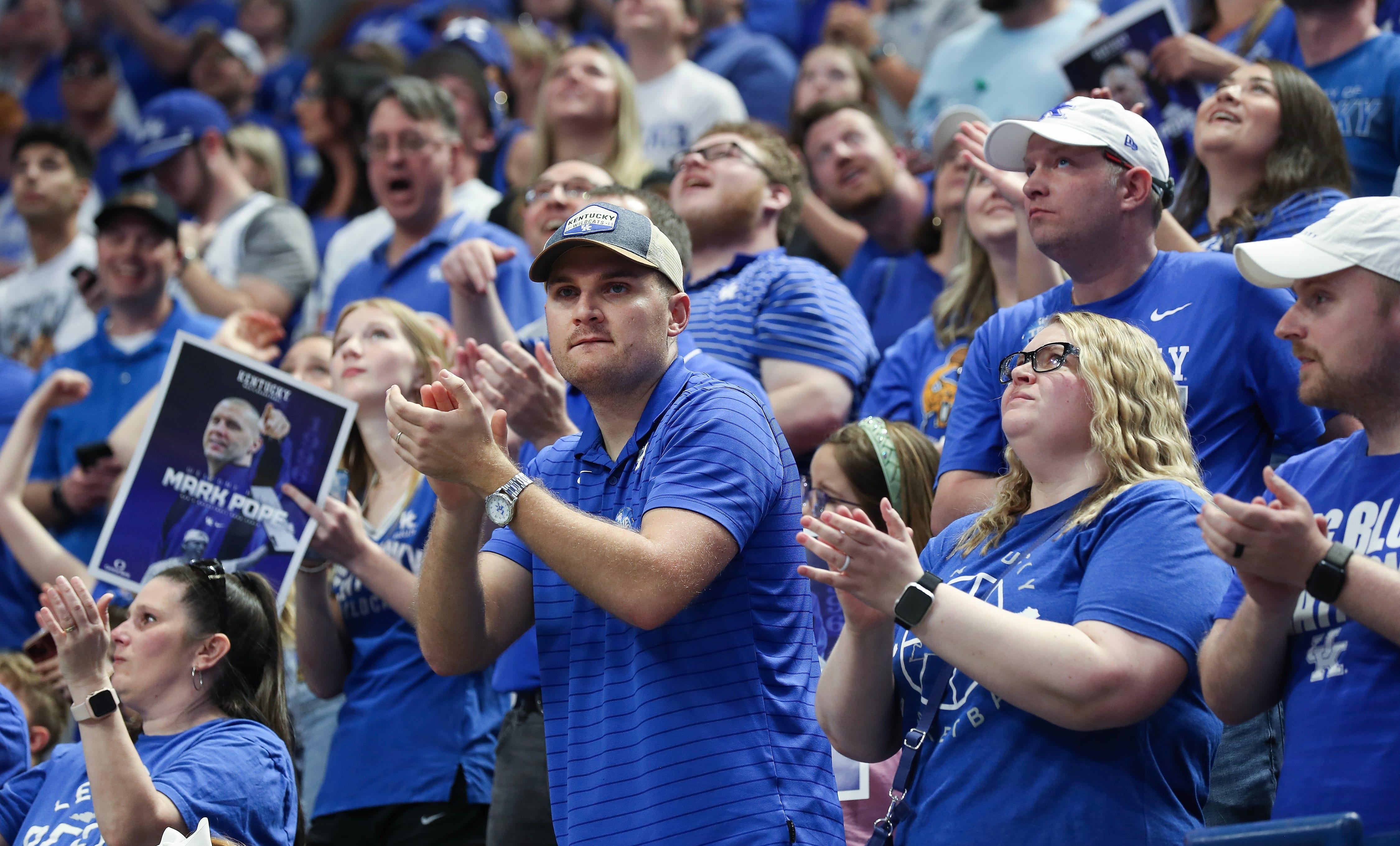Kentucky fans get excited during coach Mark Pope's introductory press conference