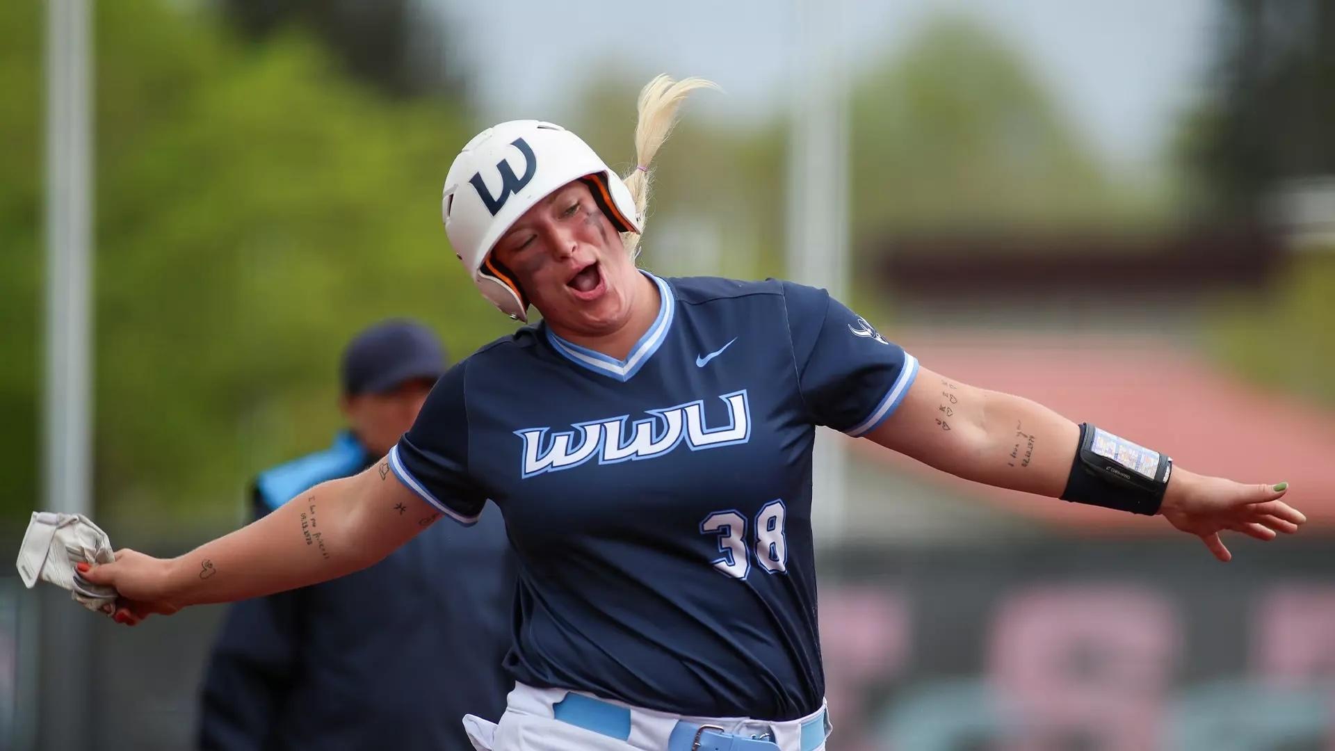 Emma Andrewjeski-Ramirez rounds the bases triumphantly after a DII softball home run.